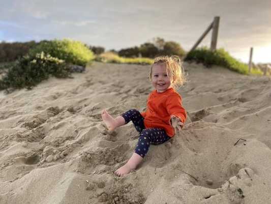 Avery enjoying the sand at Shoalhaven Heads